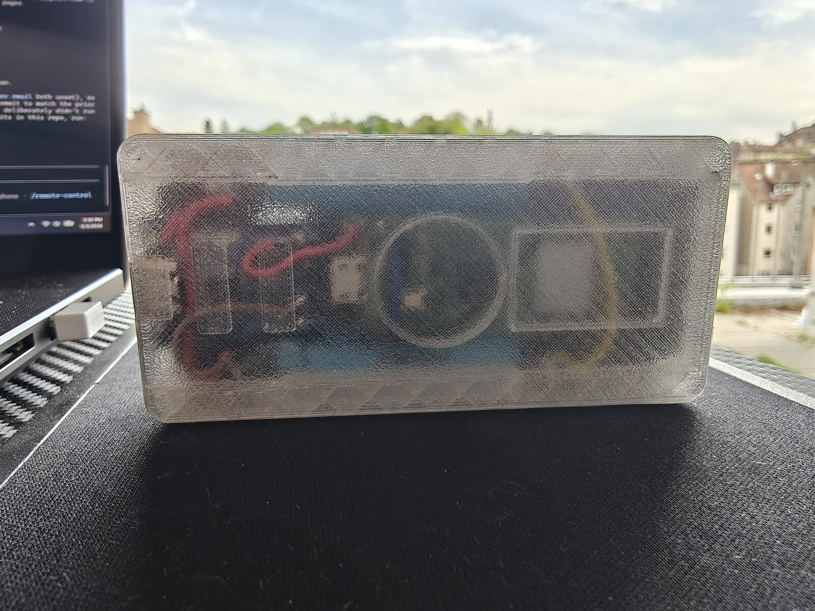 Mk2 translucent outdoors — back showing internals
