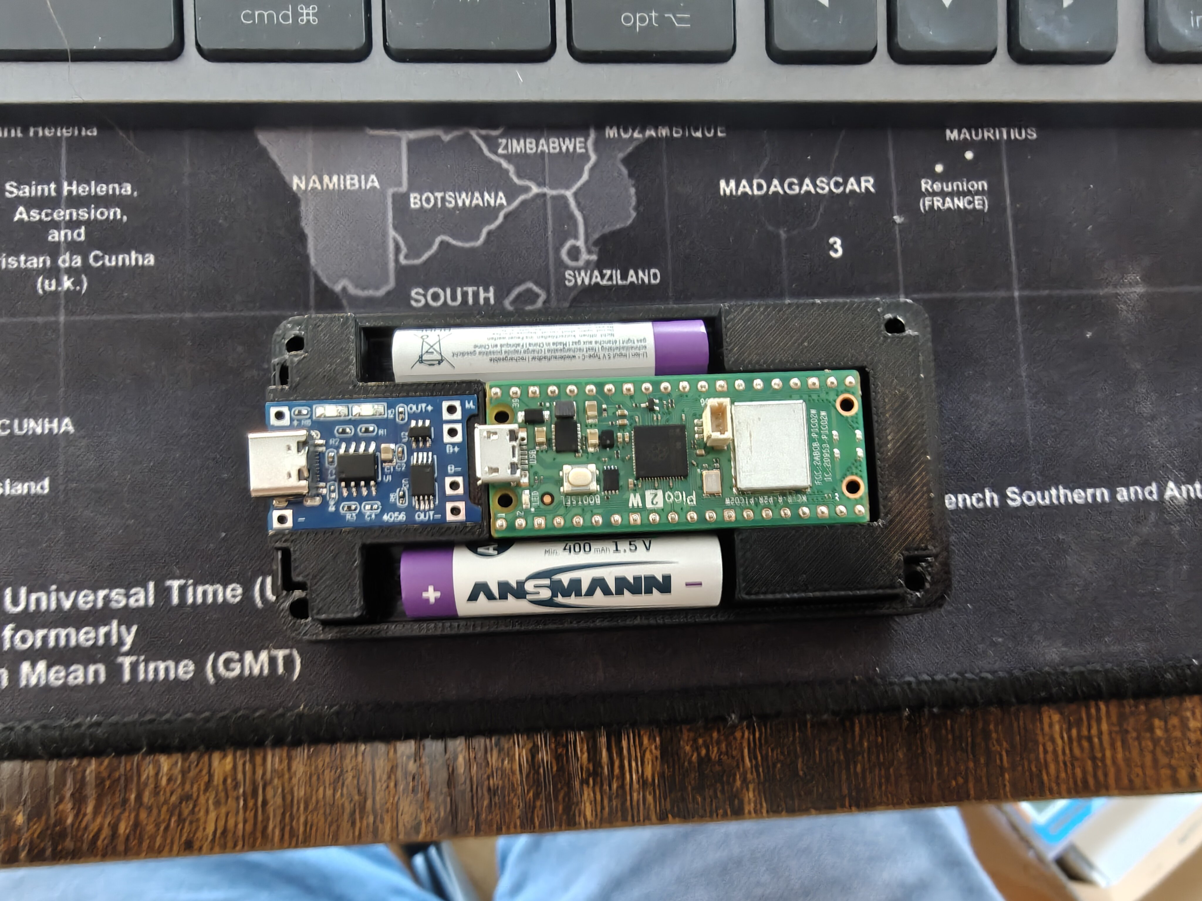 Cradle v2 top-down with Ansmann cell, Pico 2 W, and TP4056