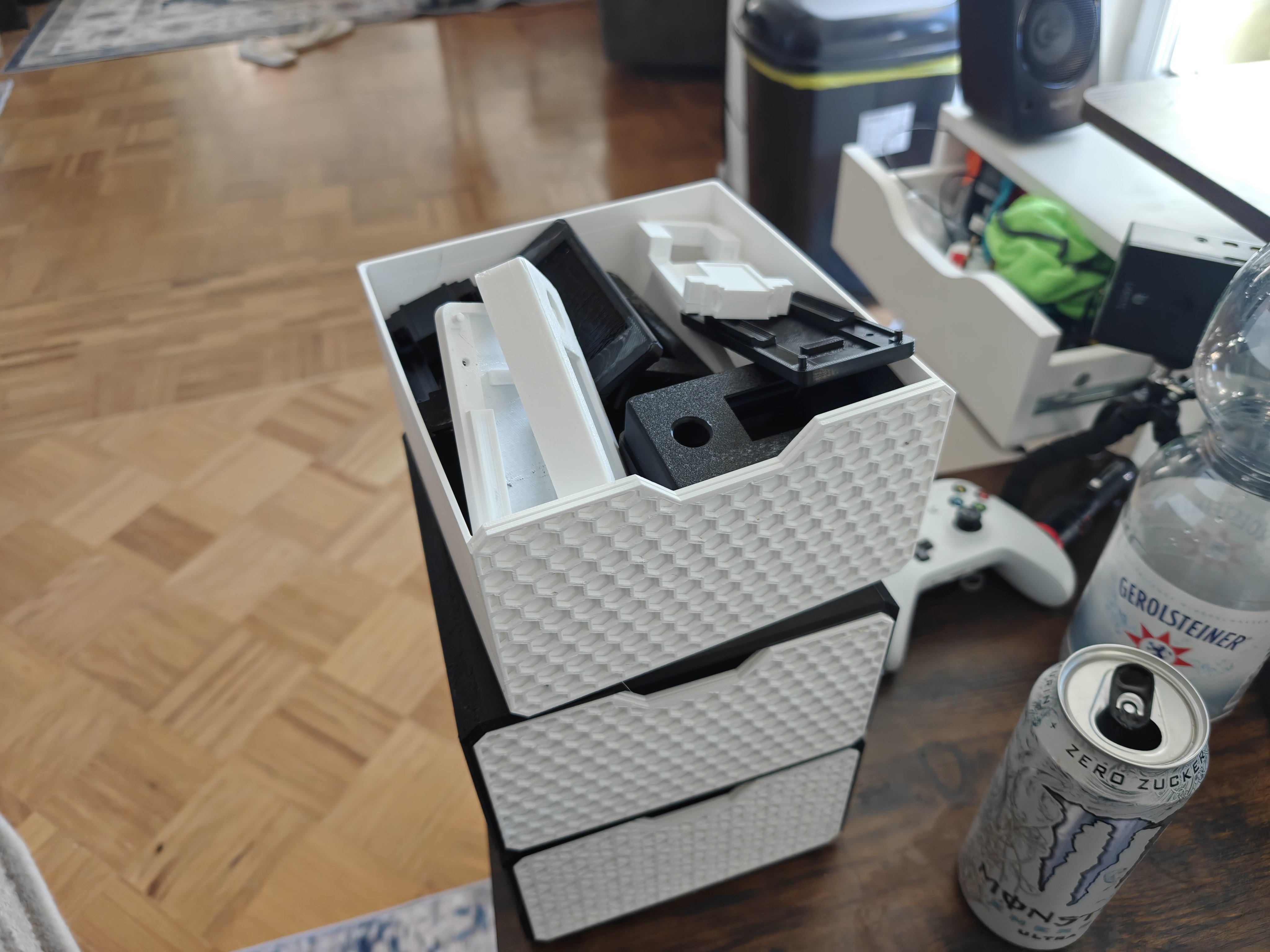 Storage drawer wide view showing three stacked drawers with printed parts